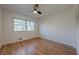 Bright bedroom with hardwood floors and a window providing natural light at 2698 Farmstead Se Rd, Smyrna, GA 30080