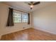 Bedroom with hardwood floors, ceiling fan and window at 2698 Farmstead Se Rd, Smyrna, GA 30080