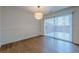 Bright dining room with hardwood floors and sliding glass doors leading to patio at 2698 Farmstead Se Rd, Smyrna, GA 30080