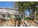 Attractive two-story residence featuring a cozy front porch and manicured landscaping at 2698 Farmstead Se Rd, Smyrna, GA 30080