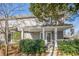 Gray two-story house with front porch and landscaping at 2698 Farmstead Se Rd, Smyrna, GA 30080