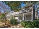 Two story gray house with a front porch, viewed from the street at 2698 Farmstead Se Rd, Smyrna, GA 30080