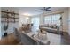 Bright living room featuring hardwood floors, natural light, and neutral paint tones at 2698 Farmstead Se Rd, Smyrna, GA 30080