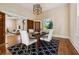 Spacious dining room with hardwood floors, and a view into the living room at 501 Dargan Sw Pl, Atlanta, GA 30310