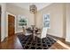 Charming dining room with hardwood floors and stylish chandelier at 501 Dargan Sw Pl, Atlanta, GA 30310