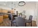 Modern kitchen with light wood cabinets and a dark blue island at 501 Dargan Sw Pl, Atlanta, GA 30310