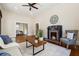 Spacious living room features a fireplace, hardwood floors, and ample natural light at 501 Dargan Sw Pl, Atlanta, GA 30310