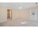 Bedroom featuring neutral walls, carpet flooring, ceiling fan, and access to the exterior at 2620 Dr Bramblett Rd, Cumming, GA 30028