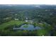 Aerial view of community featuring a golf course, pool, and tennis courts at 28 Glenald Nw Way, Atlanta, GA 30327