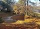 Landscaped backyard with mature trees and a peaceful atmosphere at 28 Glenald Nw Way, Atlanta, GA 30327
