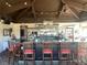 Indoor bar with seating and liquor display at 28 Glenald Nw Way, Atlanta, GA 30327