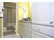 Clean bathroom with granite countertop and built-in cabinets at 28 Glenald Nw Way, Atlanta, GA 30327