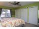 Spacious bedroom with ample closet space and a ceiling fan at 28 Glenald Nw Way, Atlanta, GA 30327