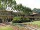 Community clubhouse with expansive decks and landscaping at 28 Glenald Nw Way, Atlanta, GA 30327