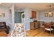 Bright dining area with hardwood floors and a view into the kitchen at 28 Glenald Nw Way, Atlanta, GA 30327
