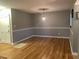 Spacious dining area with hardwood floors and neutral wall colors at 28 Glenald Nw Way, Atlanta, GA 30327