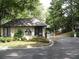 Gated community entrance with landscaping and signage at 28 Glenald Nw Way, Atlanta, GA 30327