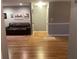 Bright entryway with hardwood floors and view into living room at 28 Glenald Nw Way, Atlanta, GA 30327