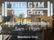 Cross Creek Gym sign, hours 5am-11pm, members only at 28 Glenald Nw Way, Atlanta, GA 30327