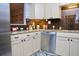 Modern kitchen featuring granite countertops and stainless steel appliances at 28 Glenald Nw Way, Atlanta, GA 30327