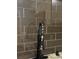 Kitchen features dark brown glass tile backsplash at 28 Glenald Nw Way, Atlanta, GA 30327