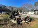 Stone patio with fire pit and seating at 28 Glenald Nw Way, Atlanta, GA 30327