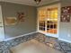 Bright sunroom features patterned tile floors and window coverings at 28 Glenald Nw Way, Atlanta, GA 30327