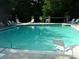 Relaxing community pool with ample seating at 28 Glenald Nw Way, Atlanta, GA 30327