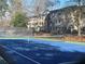 Well-maintained blue tennis court at 28 Glenald Nw Way, Atlanta, GA 30327