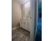 Simple bathroom with single vanity and tile floor at 3576 Mill Creek Sw Dr, Smyrna, GA 30082