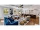 Open concept Gathering room with adjacent kitchen and hardwood floors at 500 Westover Nw Dr, Atlanta, GA 30305