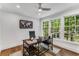 Bright home office features built-in shelving and hardwood floors at 500 Westover Nw Dr, Atlanta, GA 30305
