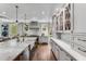 Bright kitchen with white cabinets, marble countertops, and stainless steel appliances at 500 Westover Nw Dr, Atlanta, GA 30305