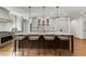 Modern kitchen with large island and white shaker cabinets at 500 Westover Nw Dr, Atlanta, GA 30305