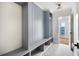 Laundry room with built-in storage and tile flooring at 500 Westover Nw Dr, Atlanta, GA 30305