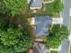 Overhead view showcasing a house, backyard, and surrounding trees at 156 Vine Creek Dr, Acworth, GA 30101