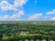 Wide shot of community with expansive green spaces and clear sky at 156 Vine Creek Dr, Acworth, GA 30101