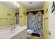 Clean bathroom with shower/tub combo and updated vanity at 156 Vine Creek Dr, Acworth, GA 30101