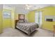 Spacious bedroom with a ceiling fan and large windows at 156 Vine Creek Dr, Acworth, GA 30101