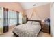 Bright bedroom with a comfortable bed and plenty of natural light at 156 Vine Creek Dr, Acworth, GA 30101