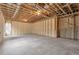 Unfinished basement with exposed framing and insulation at 160 Cedarwood Ln, Roswell, GA 30075