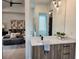 Modern bathroom with floating vanity and elegant lighting at 160 Cedarwood Ln, Roswell, GA 30075