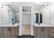 Modern bathroom with double vanity, and a view into the bedroom at 160 Cedarwood Ln, Roswell, GA 30075