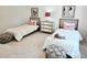 Bright bedroom featuring hardwood floors, plush carpet, and two twin beds at 160 Cedarwood Ln, Roswell, GA 30075