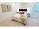 Comfortable bedroom with a queen bed and decorative wall art at 160 Cedarwood Ln, Roswell, GA 30075