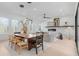 Bright dining room with wood table and large windows at 160 Cedarwood Ln, Roswell, GA 30075