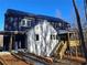 Modern home with solar panels and deck overlooking woods at 160 Cedarwood Ln, Roswell, GA 30075