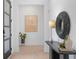 Bright foyer with light hardwood floors and modern decor at 160 Cedarwood Ln, Roswell, GA 30075