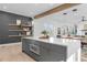 Modern kitchen island with gray cabinetry and quartz countertop at 160 Cedarwood Ln, Roswell, GA 30075