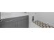 Functional laundry room with modern cabinets, stylish backsplash, and countertop space at 160 Cedarwood Ln, Roswell, GA 30075